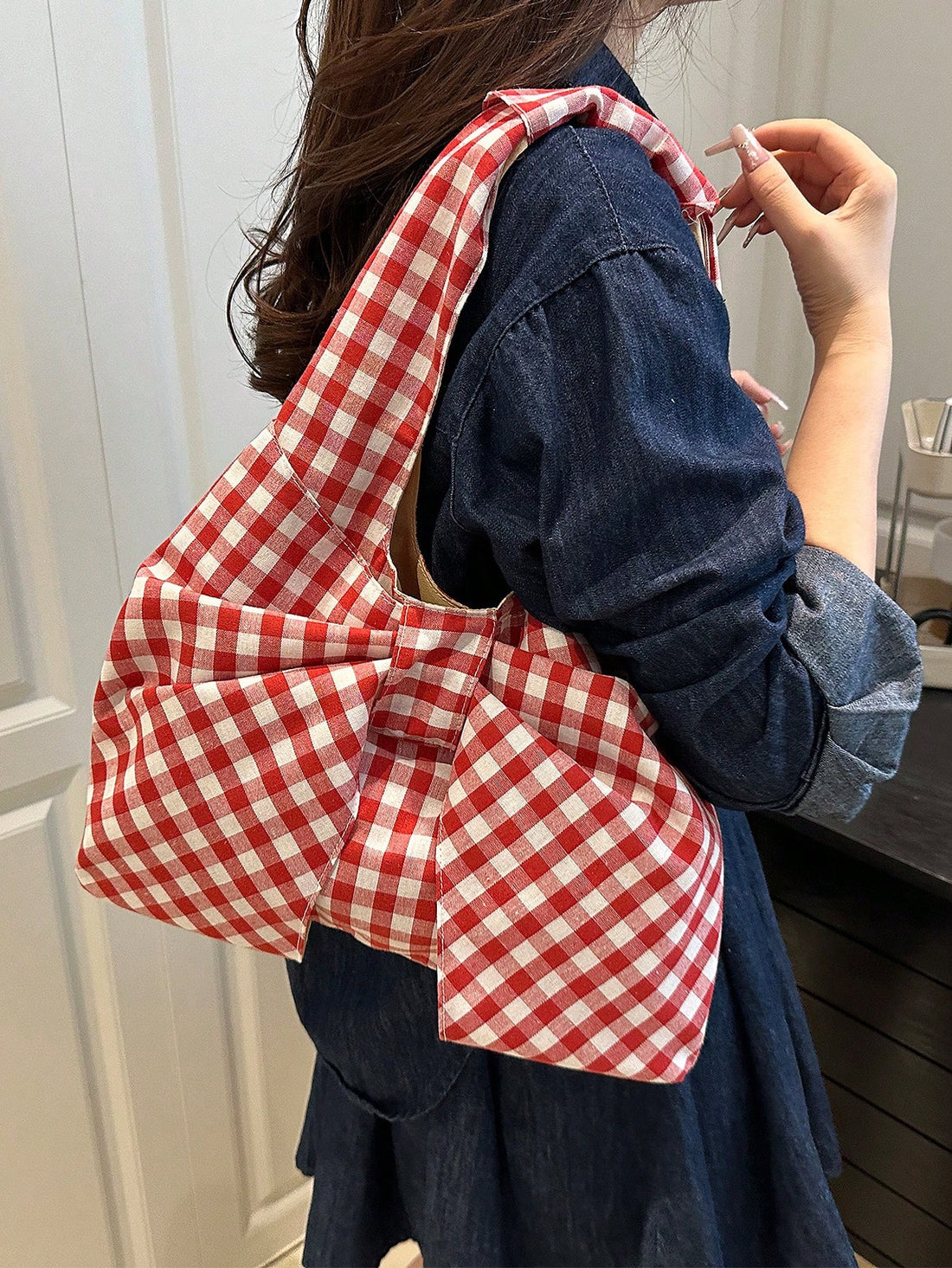 Step out in style with this Chic Checkered Bow Shoulder Bag, perfect for your next adventure or everyday hustle. Its bold checkered pattern and playful bow detail add a flirty twist to your look, while the roomy interior keeps all your essentials close—whether you're commuting, traveling, or just out and about. Lightweight and versatile, this bag is your new go-to for effortless charm and practical fun!
