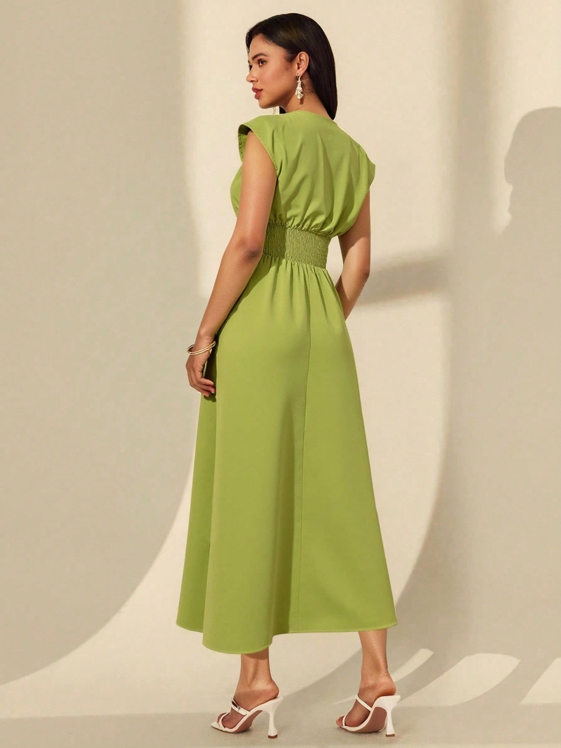 Elevate your summer wardrobe with this stunning V-neck dress that's equal parts chic and comfortable. The front twist detail adds a flirty touch of sophistication, while the flowing long silhouette keeps you cool and graceful through warm days. Perfect for brunch dates, casual outings, or whenever you want to look effortlessly put-together without trying too hard. Slip it on and let the dress do the talking—because looking this good should feel this easy.