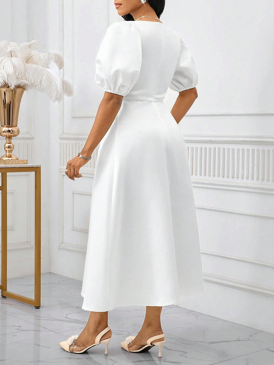 Step into sunshine with this Elegant White Puff Sleeve Dress—your go-to for spring and summer celebrations! Flirty puff sleeves add a touch of whimsy, while the crisp white hue keeps things fresh and radiant. Whether you're dancing at a wedding, cheering at a graduation, or mingling at a cocktail party, this dress brings effortless charm and playful elegance to every occasion.