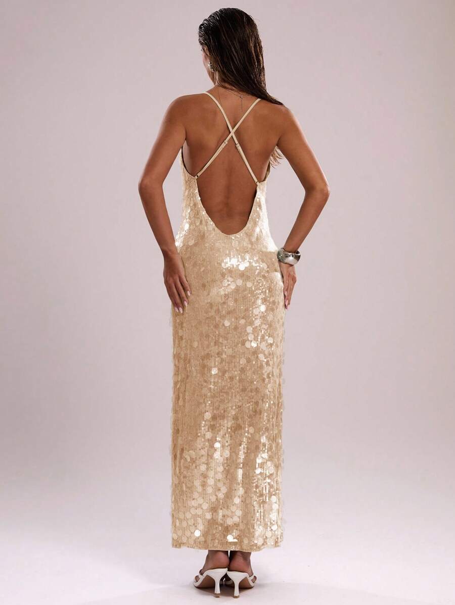 Dazzle in this stunning mint green sequin halter neck dress, the perfect choice for summer beach vacations and unforgettable parties. Featuring a sleek backless design with a flattering spaghetti strap neckline, this maxi dress combines elegance with eye-catching sparkle. The all-over sequin detailing catches light beautifully, while the side slit adds movement and sophistication. Crafted from a comfortable polyester-elastane blend with slight stretch, the lined construction ensures a smooth silhouette. Ide