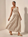 Beige one-shoulder cutout maxi dress angled front view