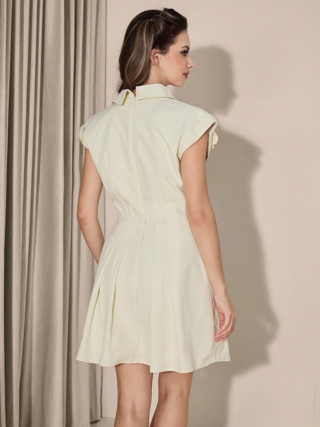 Meet your new favorite dress! This light apricot mini features stunning 3D floral details that add dimension and charm to every outfit. Whether you're heading to work, a special event, or school, this versatile piece transitions seamlessly through your day. The soft apricot hue flatters all skin tones, while the textured florals create visual interest that turns heads. Comfortable enough for all-day wear yet polished enough to impress, it's the playful-yet-elegant staple every wardrobe needs. Inspired by ti