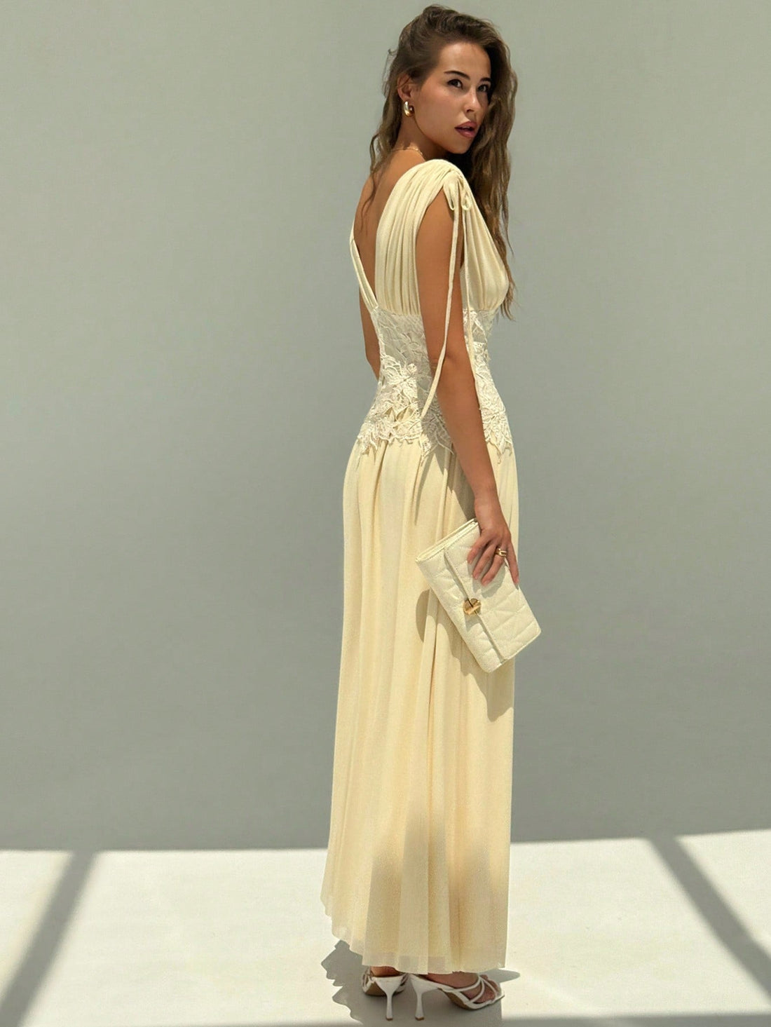 Step into sunshine and style with this elegant summer vacation dress. Featuring delicate patchwork lace and a flattering V-neck, it’s designed to keep you cool and charming all day long. The drawstring tie shoulders add a flirty, adjustable touch, perfect for beach days or sunset strolls. Light, breezy, and effortlessly chic—this dress is your new go-to for warm-weather adventures with a playful twist.