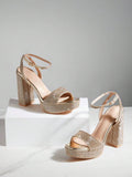Black rhinestone platform sandals for evening celebrations