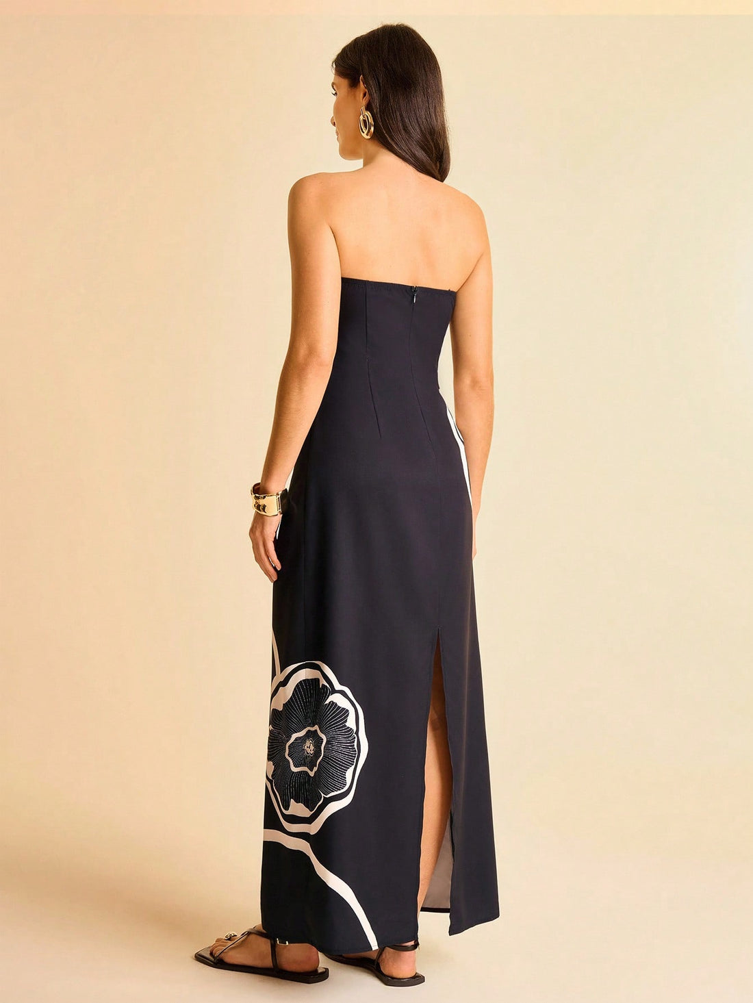 Twirl into summer with this stunning strapless fitted dress that's basically a love letter to floral prints. Perfect for beach getaways, garden parties, or any occasion where you want to feel effortlessly chic, this dress hugs you in all the right places while the vibrant blooms do the talking. Whether you're sipping cocktails by the pool or dancing under the stars, you'll turn heads and feel absolutely fabulous. A wardrobe essential that proves elegance never goes out of style.