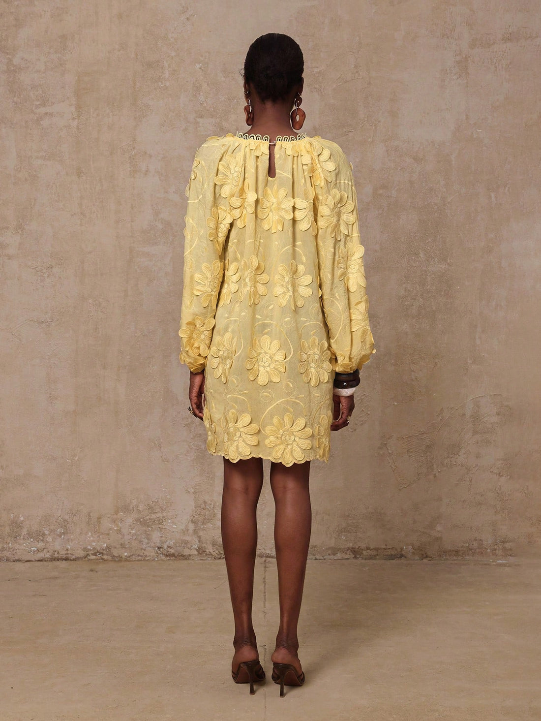 Brighten your sunny days with this playful yellow floral embroidered short dress. Designed for spring and summer getaways, its delicate ruffles and vibrant embroidery add a flirty, feminine touch perfect for beach strolls or resort lounging. Lightweight and breezy, this dress keeps comfort and style in perfect harmony for your warm-weather adventures.