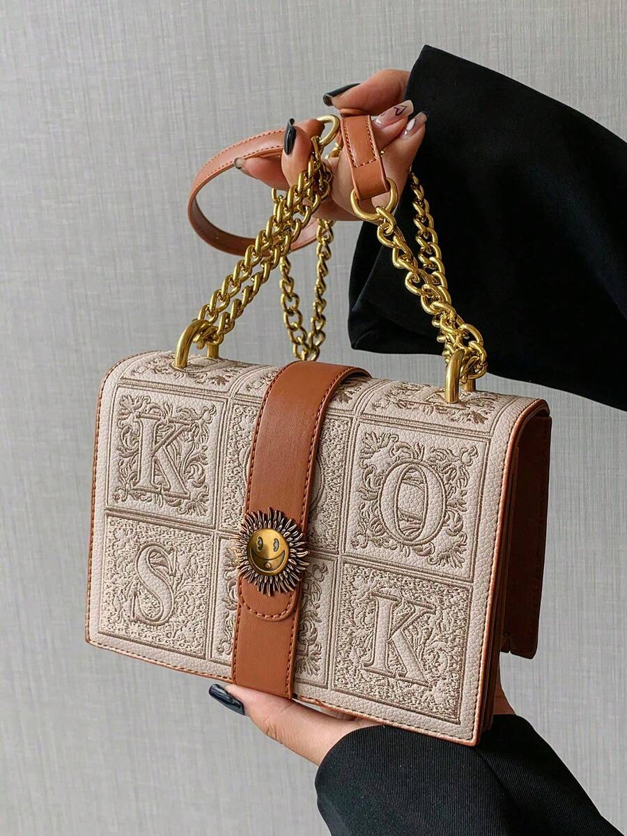 Adjustable tan shoulder strap with buckle for mini box crossbody bag
