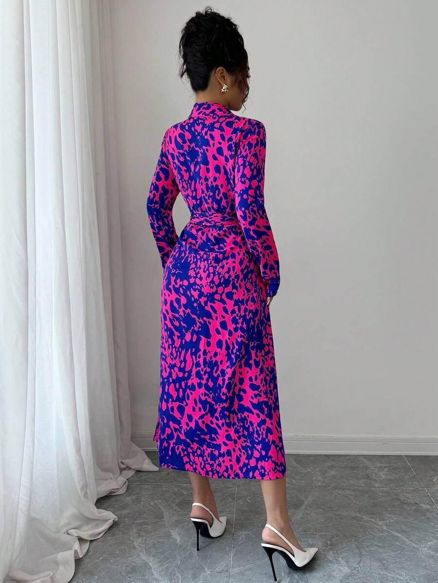 Unleash your wild side with this stunning leopard print maxi dress that's equal parts sophisticated and fun. Featuring a classic shirt collar and long sleeves, it's the perfect layering piece for crisp fall days. The flowing maxi silhouette flatters every frame while the timeless leopard pattern adds instant personality to your wardrobe. Dress it up with heels for a night out or keep it casual with sneakers for effortless everyday style. This versatile piece is your new go-to for making a bold fashion state