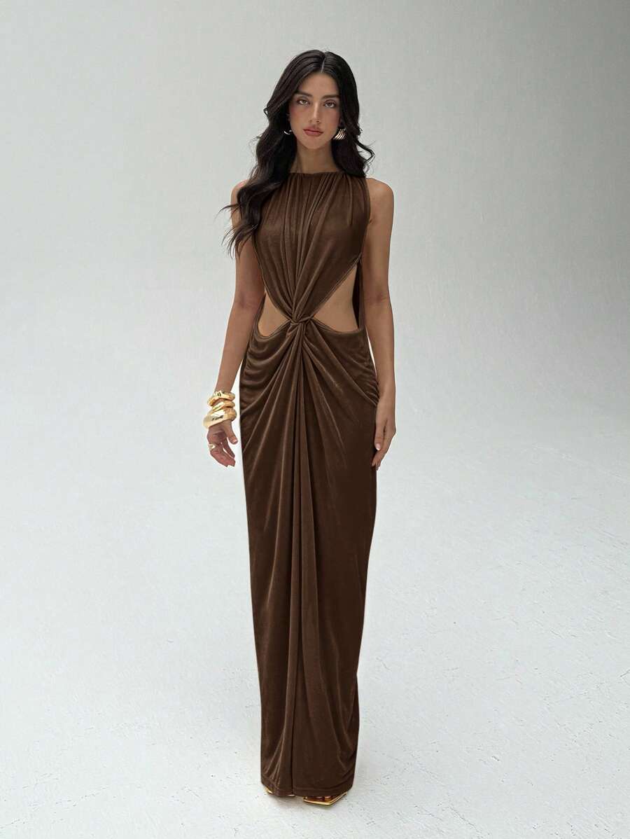 Turn heads with this Chic Sleeveless Cutout Bodycon Dress that blends boldness and elegance effortlessly. Its sleek silhouette hugs your curves while the playful cutouts add a flirty edge, making it perfect for day-to-night wear. Step into style and confidence with a dress that’s as fun to wear as it is to show off.