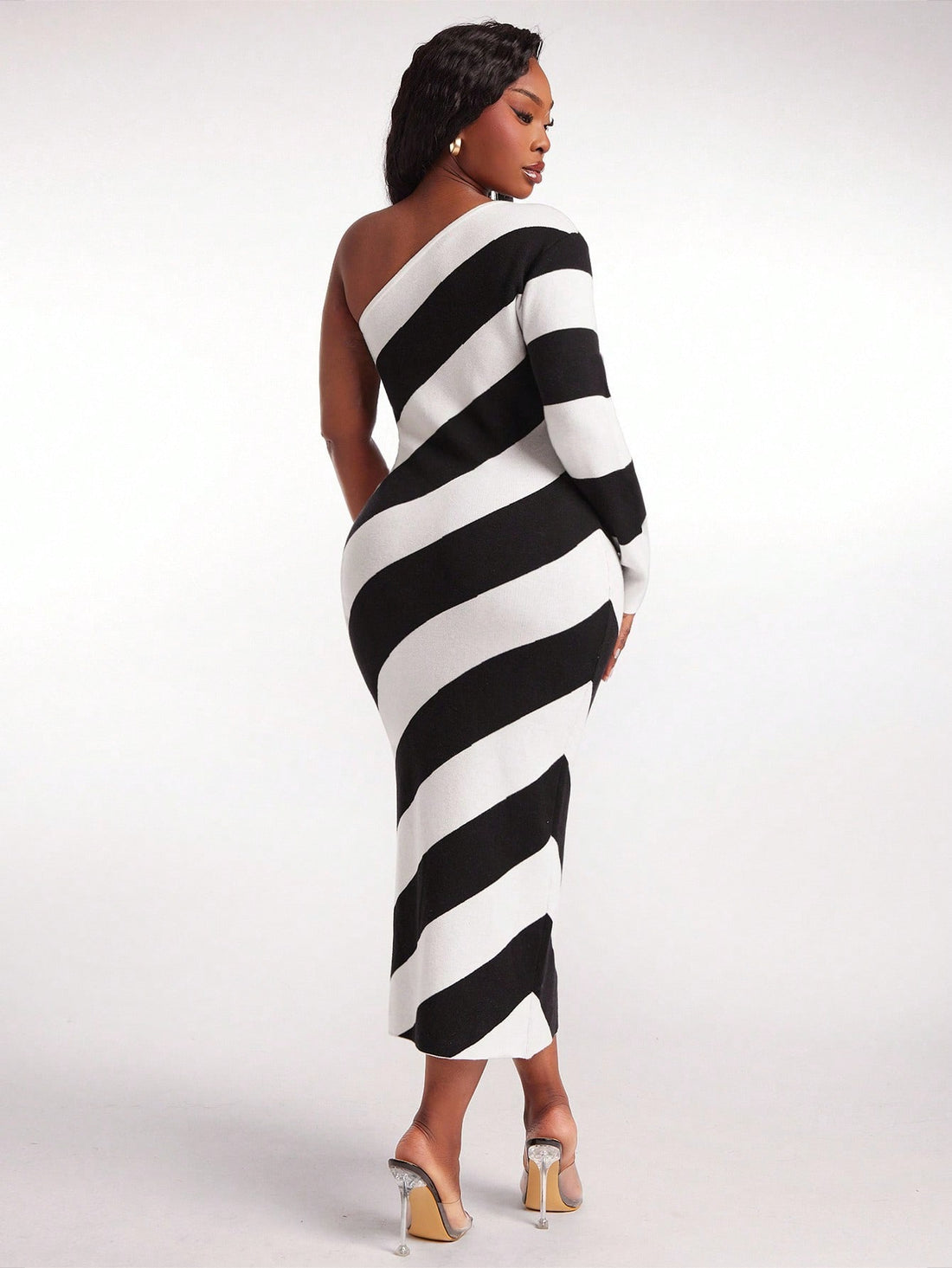 Turn heads with this Elegant Plus Size One-Shoulder Striped Bodycon Sweater Dress, perfect for cozy fall and winter office days. Its figure-hugging silhouette and playful one-shoulder design create a chic balance of warmth and style. The classic stripes add a dash of fun while keeping it professional—ideal for making your workwear stand out without trying too hard. Stay comfy, look fabulous!