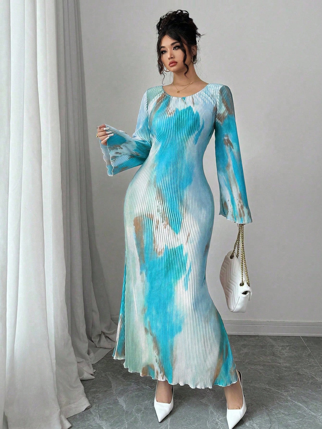 Make a splash this fall with our Trendy Plus Size Tie-Dye Mermaid Hem Dress! Featuring playful flare sleeves and a flattering mermaid hem, this dress effortlessly combines comfort and style. Perfect for cozy days or festive outings, its vibrant tie-dye pattern adds a fun, eye-catching twist to your seasonal wardrobe. Embrace your curves and let your style shine!