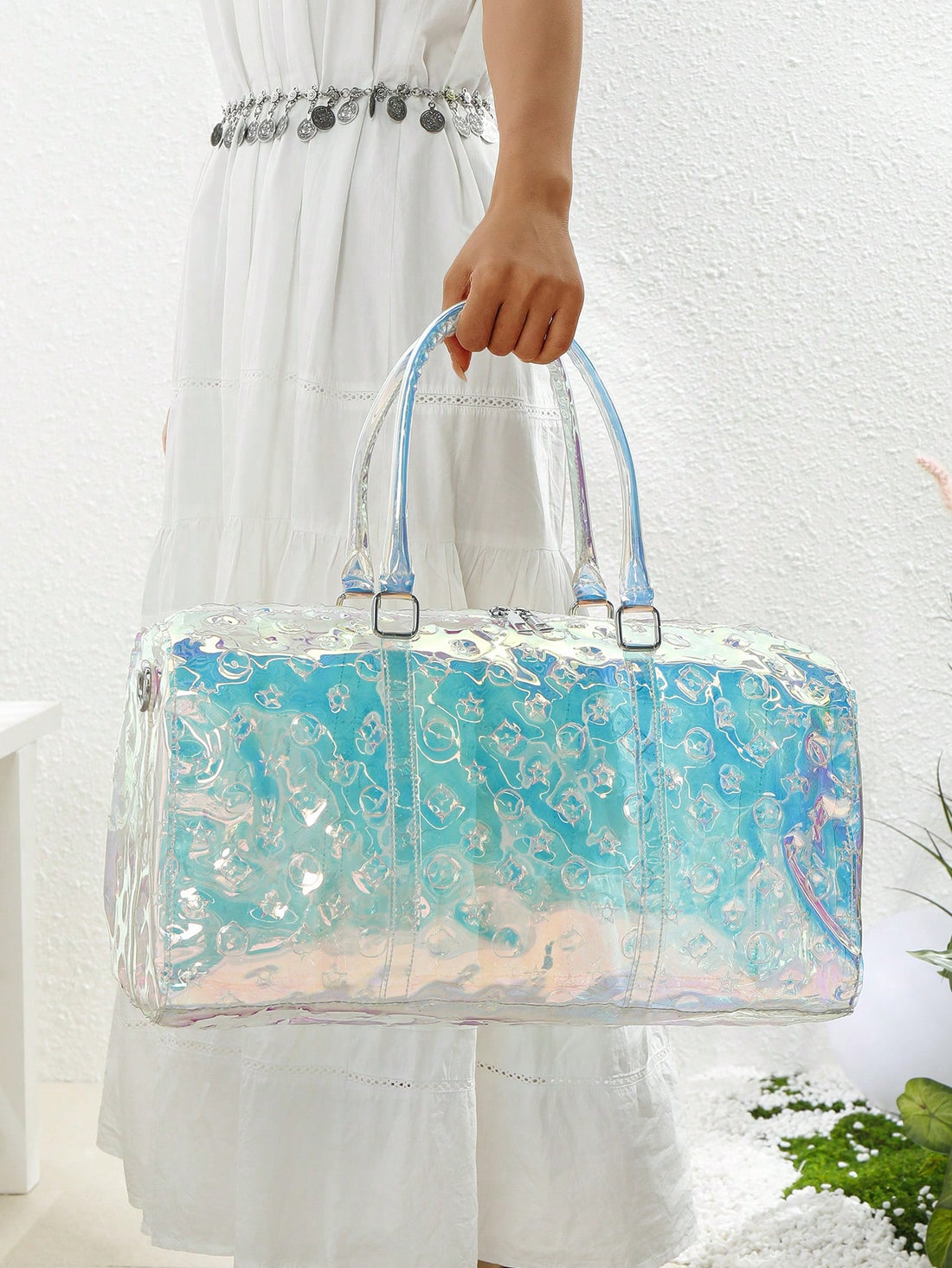 Make your travels sparkle with this PVC holographic jelly bag! Spacious and lightweight, it’s perfect for gym gear, sports essentials, or business trip must-haves. Durable and easy to clean, this versatile bag keeps you organized while adding a fun, futuristic flair to your style wherever you go.