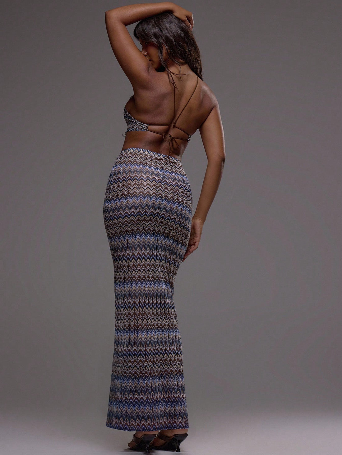 Turn heads with this Elegant Halterneck Striped Crochet Maxi Dress, perfect for boho summer festivals and beach getaways. Its airy crochet design and flattering halterneck silhouette keep you cool and stylish under the sun. Embrace carefree vibes while feeling effortlessly chic in this playful, striped maxi that dances with every step. Ideal for making memories that last all season long!