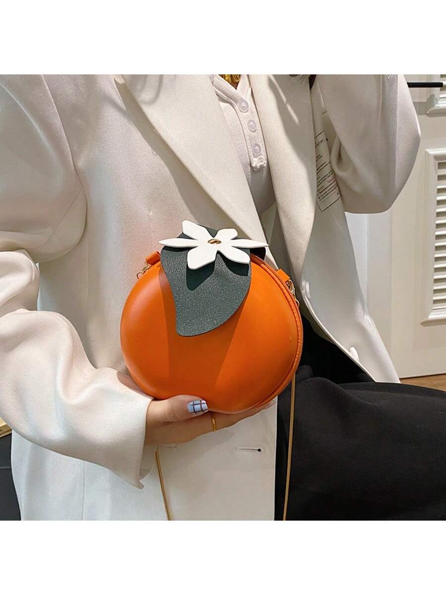 Elevate your everyday carry with this striking orange PU shoulder bag, designed for the modern woman who values both style and function. The compact round silhouette offers a contemporary aesthetic while maintaining practical storage capacity for essentials. Crafted from durable polyurethane material, this versatile piece transitions seamlessly from casual outings to weekend adventures. The structured shoulder strap ensures comfortable, hands-free carrying, while the rich orange hue makes a confident fashio