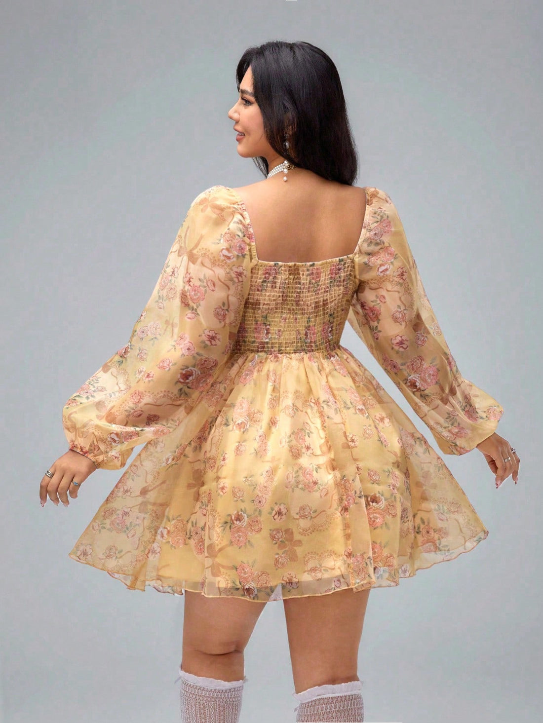 Step into spring and summer with this Elegant Floral Print Plus Size Organza Dress. Its airy organza fabric and charming lantern sleeves bring a whimsical touch perfect for sunny vacations. The playful floral pattern brightens your look while the flattering plus size fit ensures comfort and confidence wherever you go. Feel effortlessly stylish and ready for any sunny adventure!