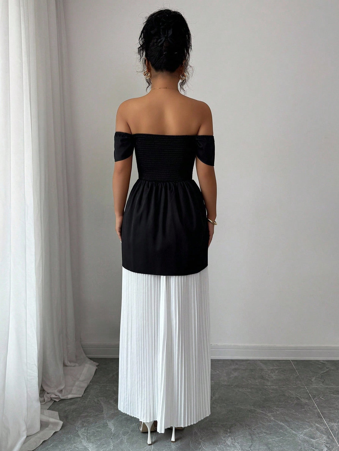 Turn heads at your next event in this show-stopping asymmetrical strapless dress! Featuring a chic colorblock design paired with eye-catching rhinestone embellishments, this dress strikes the perfect balance between bold and elegant. The strapless cut offers a flattering silhouette while the asymmetrical hemline adds modern flair. Whether you're heading to a cocktail party, wedding, or night out, this stunner delivers instant glamour and confidence. Dress it up with heels and statement jewelry for a look th