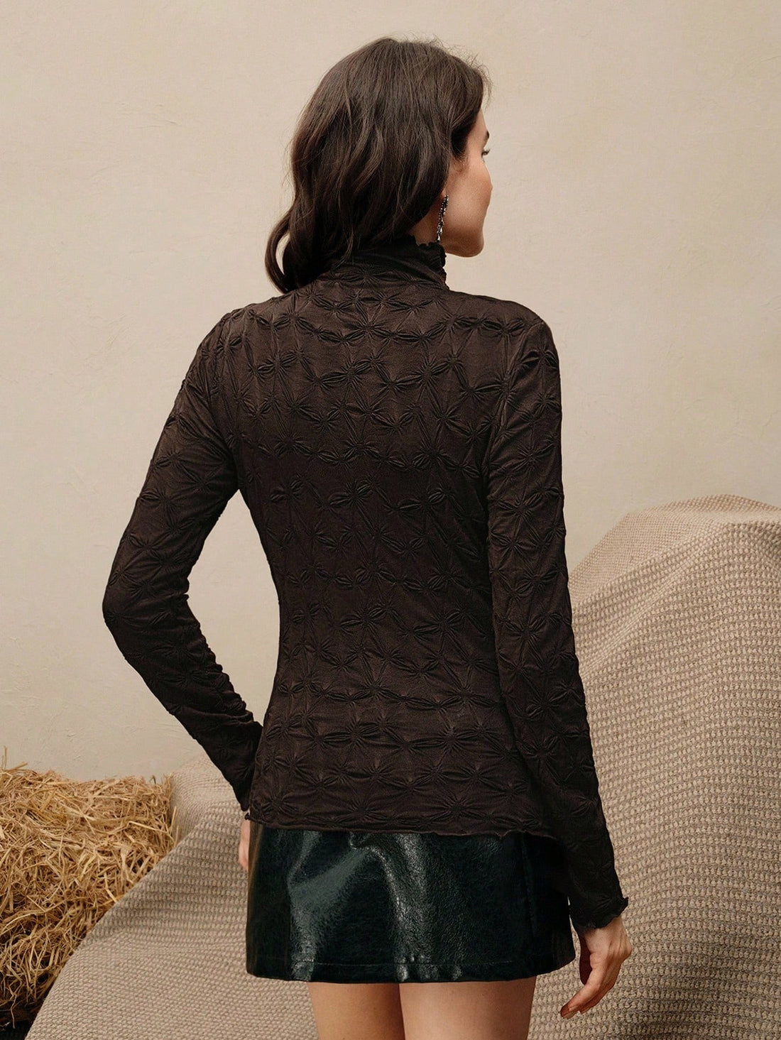 Elevate your everyday wardrobe with this chic turtleneck that's anything but basic. The slim fit hugs your silhouette just right, while the textured fabric adds visual interest and dimension. Perfect for layering under blazers or wearing solo, this long-sleeve essential transitions seamlessly from office to weekend brunch. Cozy, sophisticated, and endlessly versatile—your new go-to piece awaits.