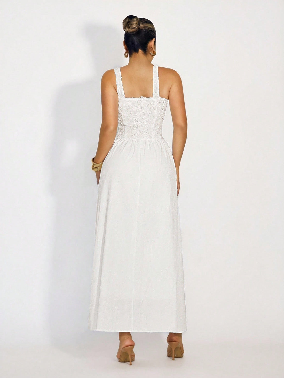 This stunning sleeveless dress combines vibrant floral patchwork panels for a look that's equal parts sophisticated and fun. The mixed botanical prints create visual interest while the tailored silhouette flatters every figure. Perfect for garden parties, weddings, or any occasion calling for effortless elegance. The breathable fabric keeps you comfortable all day long, while the timeless design ensures you'll reach for it season after season. Dress it up with heels and statement jewelry, or keep it casual 