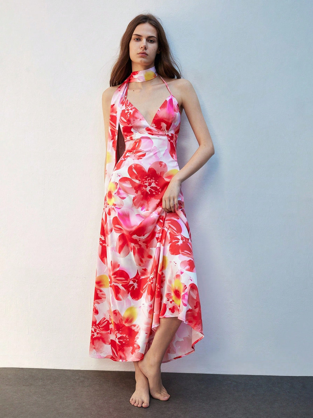 Step into the holiday spotlight with this Elegant Floral Print Maxi Halter Dress designed just for festive fun. Flowing fabric and a graceful halter neckline combine comfort with charm, making it your go-to choice for Christmas and New Year's celebrations. Bright florals and a flattering maxi length add just the right touch of whimsy to keep you dancing all night long. Celebrate in style and let your festive spirit bloom!