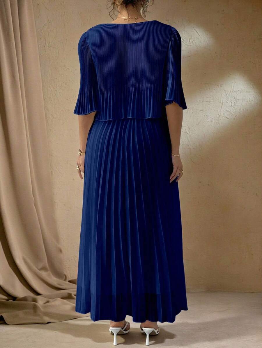 Elevate your warm-weather wardrobe with this stunning plus-size chiffon pleated dress that effortlessly transitions from brunch to evening plans. The flowing chiffon fabric drapes beautifully while the delicate pleats add dimension and movement, creating a silhouette that's both flattering and comfortable. Perfect for spring and summer occasions, this dress pairs timeless elegance with relaxed, approachable style. Whether you're dressing up for a special event or keeping it casual, this versatile piece beco