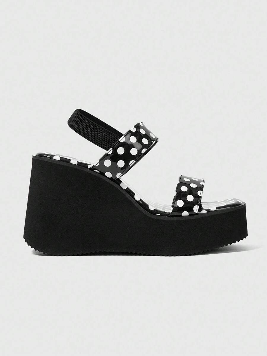 Step up your style game with these Trendy Grunge Punk Black High-Heel Sandals. Featuring a chunky thick sole, they add bold height and an edgy attitude to any outfit. Perfect for making a statement, these sandals blend punk vibes with modern flair, giving you a confident boost wherever you go. Walk tall and turn heads with every step!