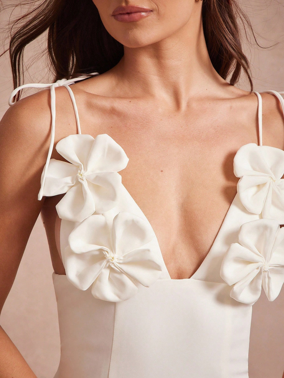 Step into summer elegance with this playful mini dress! Featuring delicate spaghetti straps and charming 3D flower details, it’s perfect for turning heads at any formal event. Light and flirty, this dress brings a fresh burst of style and fun to your warm-weather wardrobe.