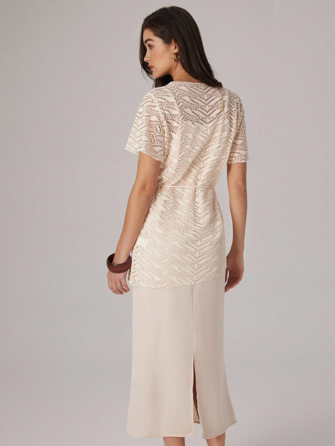 Elevate your wardrobe with this chic two-piece set that effortlessly blends sophistication with modern flair. Featuring a solid color palette, an eye-catching asymmetric hem, and a charming tassel tie detail, this set strikes the perfect balance between elegant and fun. Whether you're dressing up for a night out or keeping it casual, this versatile ensemble adapts to your style. The thoughtful design elements add personality without overwhelming your look, making it a go-to piece for anyone who loves fashio