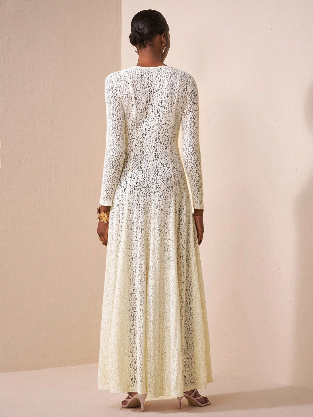 Step into the spotlight with this Elegant Transparent Lace Long Sleeve Dress, perfect for turning heads at both upscale parties and casual dates. Its delicate lace design offers a flirty peek while the long sleeves add a touch of sophistication. Light, airy, and effortlessly chic, this dress lets you play with style and charm wherever you go.