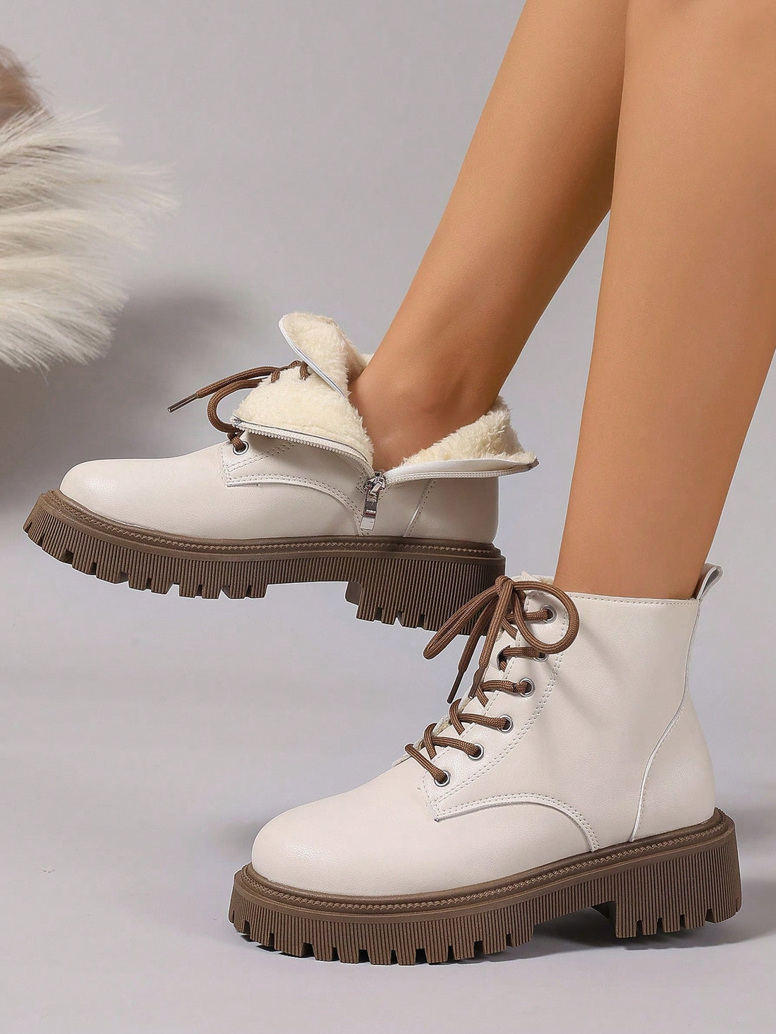 Step out in style with these playful leather ankle boots designed just for you! Perfect for autumn and winter, their flat soles and lace-up design keep your feet comfy and secure all day. Whether you're out for a casual stroll or spicing up your everyday look, these versatile boots add a fun twist to any outfit. Embrace cool-weather fashion with a splash of charm and ease!