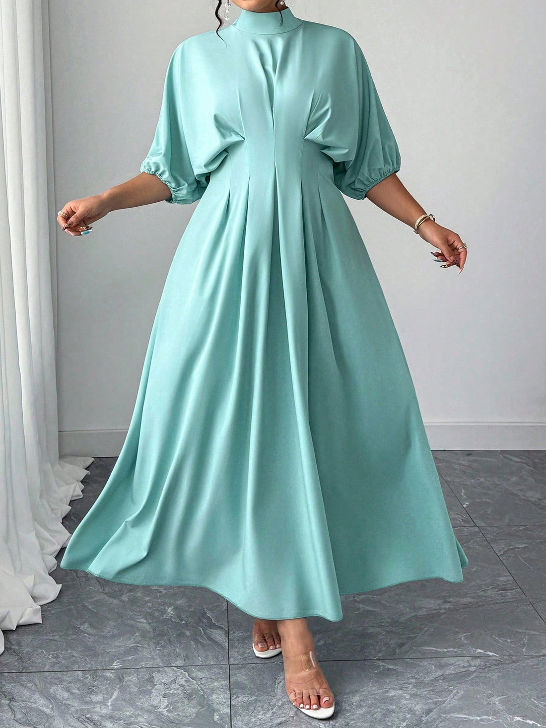 Step into charm with this Elegant Lantern Sleeve Long Dress, featuring playful lantern sleeves and a flattering pleated waist that dances with every move. The round neck design adds a touch of classic grace, making it perfect for both casual outings and special occasions. Embrace effortless style and twirl into your day with confidence and fun!