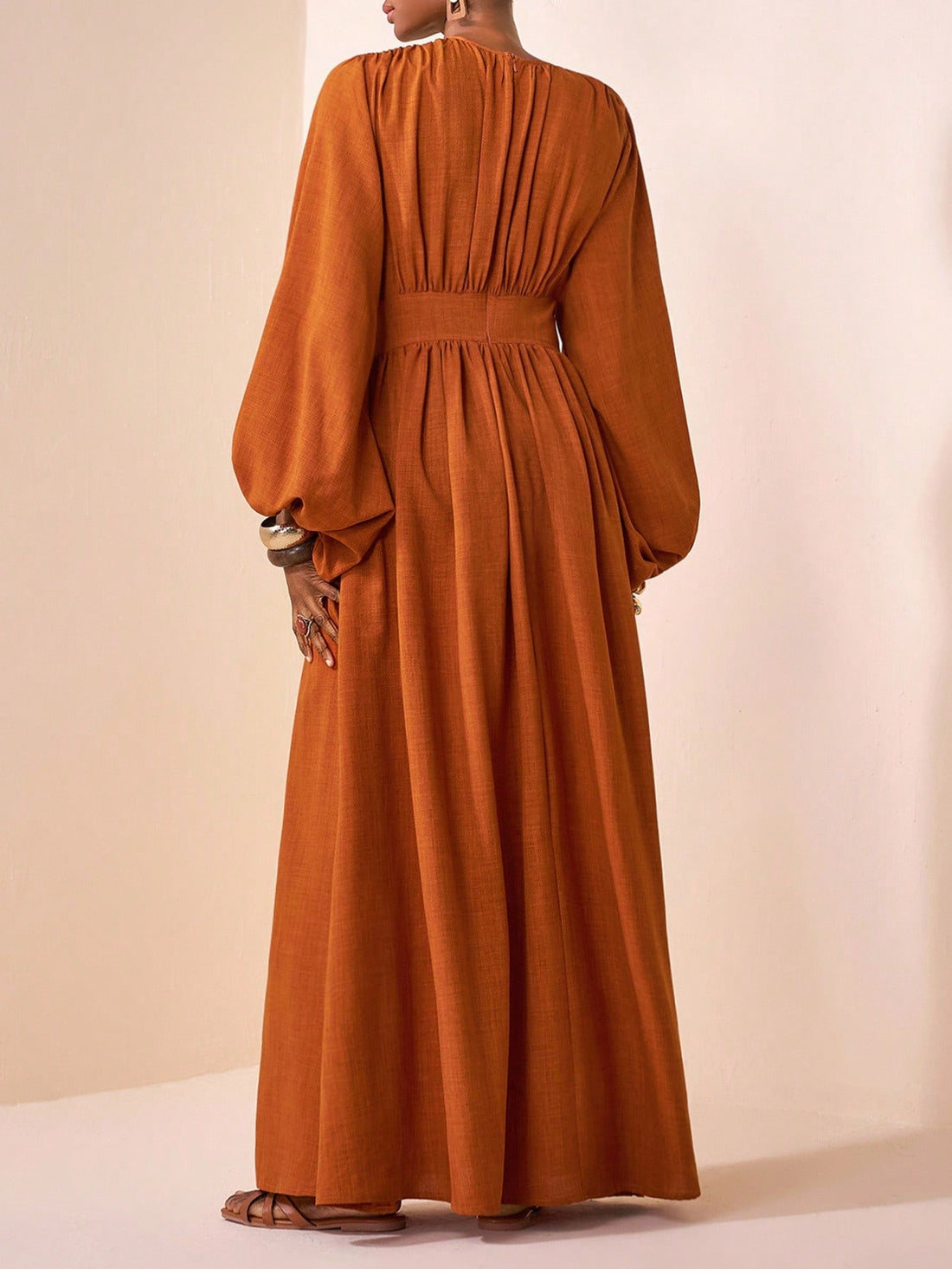Slip into the warm embrace of autumn with this brown maxi dress designed to turn heads whether you're strolling on a romantic getaway or simply owning your everyday style. Its flowing fabric moves with you, blending comfort and elegance effortlessly. Perfect for lazy brunches or sunset dinners, this dress adds a playful yet sophisticated touch to your wardrobe. Embrace the season and let your charm shine in every step.
