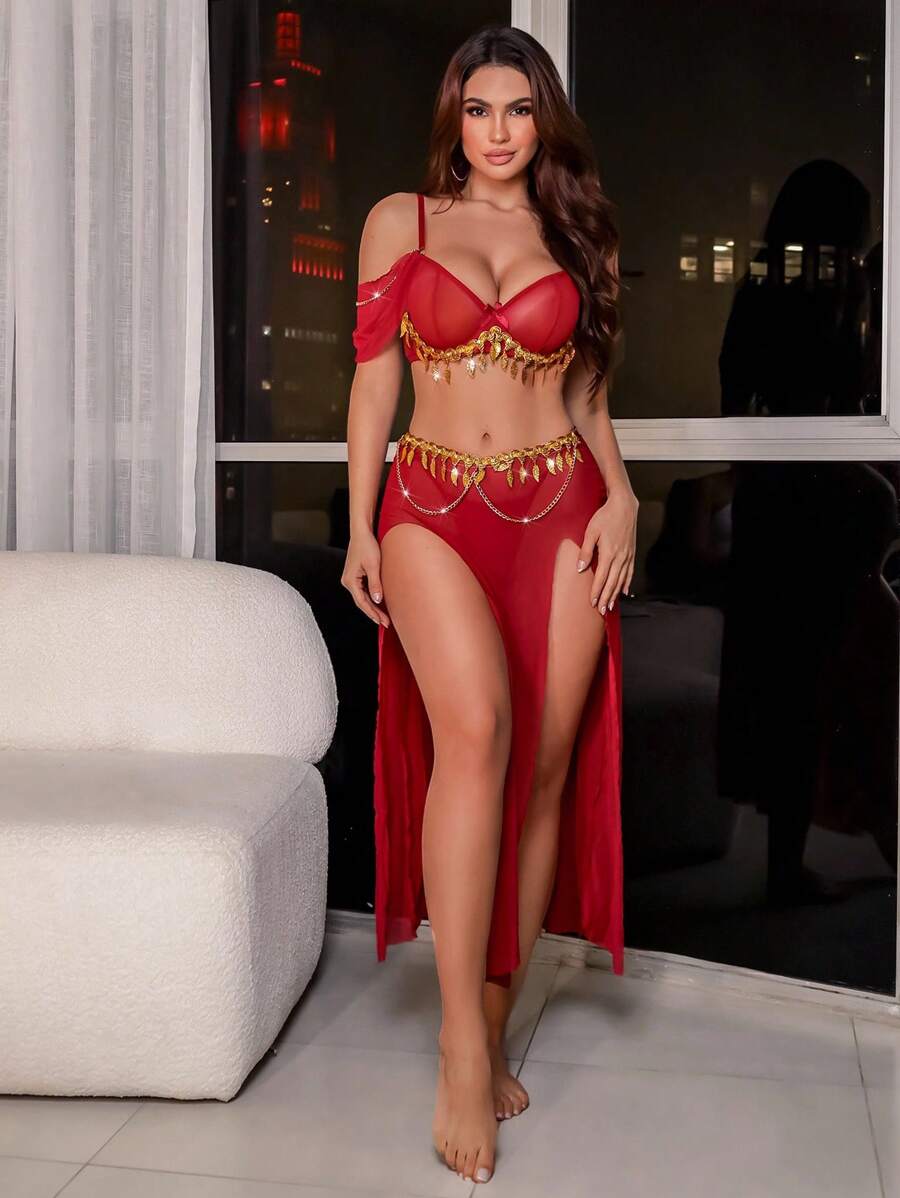 Burgundy three-piece fantasy lingerie set with sheer skirt and gold hip chain detail