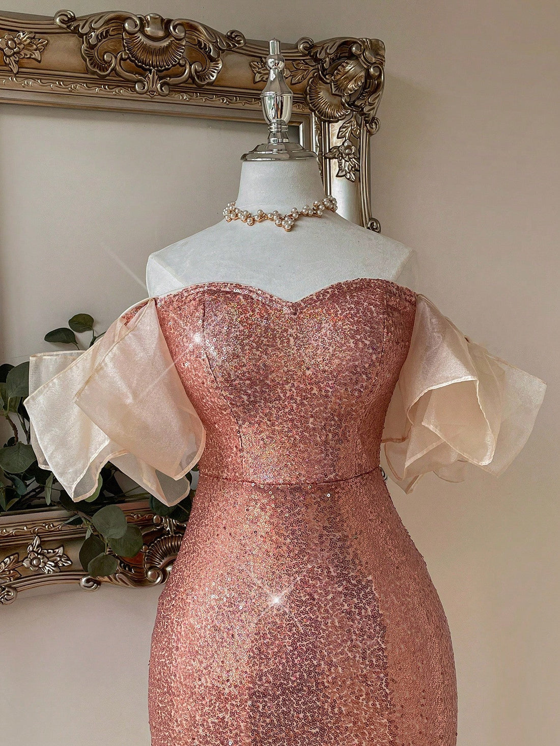 Turn heads at your next event with this playful champagne sequined fishtail bodycon dress. Its shimmering sequins catch the light beautifully, while the asymmetrical puff sleeves add a fun, flirty touch. The fishtail silhouette hugs your curves and flares out gracefully, perfect for dancing the night away in style. Ideal for special occasions when you want to sparkle with confidence and charm.