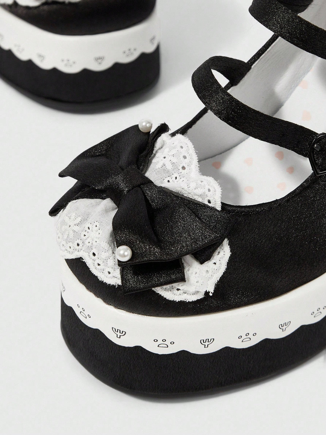 Step up your style game with these Black High Heel Mary Jane Shoes, a perfect blend of playful charm and gothic edge. Featuring a waterproof platform perfect for any weather, they boast a cute bowknot detail that adds a flirty twist. Whether you're dancing the night away or making a bold statement, these pumps deliver comfort and confidence with every step.