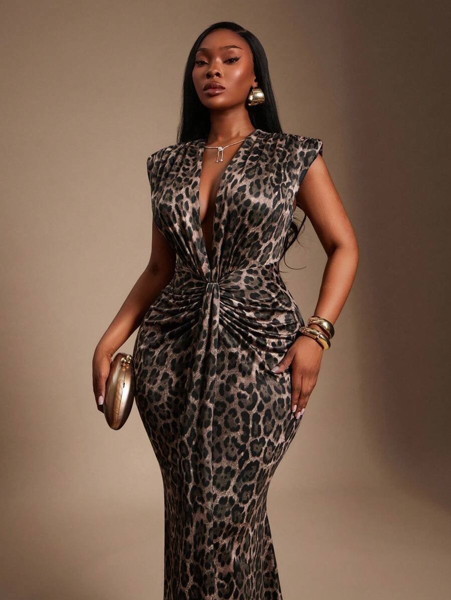 Own every moment in this gorgeous plus-size fishtail dress that brings the sparkle and sophistication! The shimmering deep V-neckline is pure elegance, while structured padded shoulders give you that confident, runway-ready silhouette. The graceful fishtail hem adds drama and movement that'll have you feeling like the star of any event. From black-tie affairs to cocktail nights, this dress adapts to your style and celebrates your curves with flair. Pair it with your favorite heels and prepare for a night of