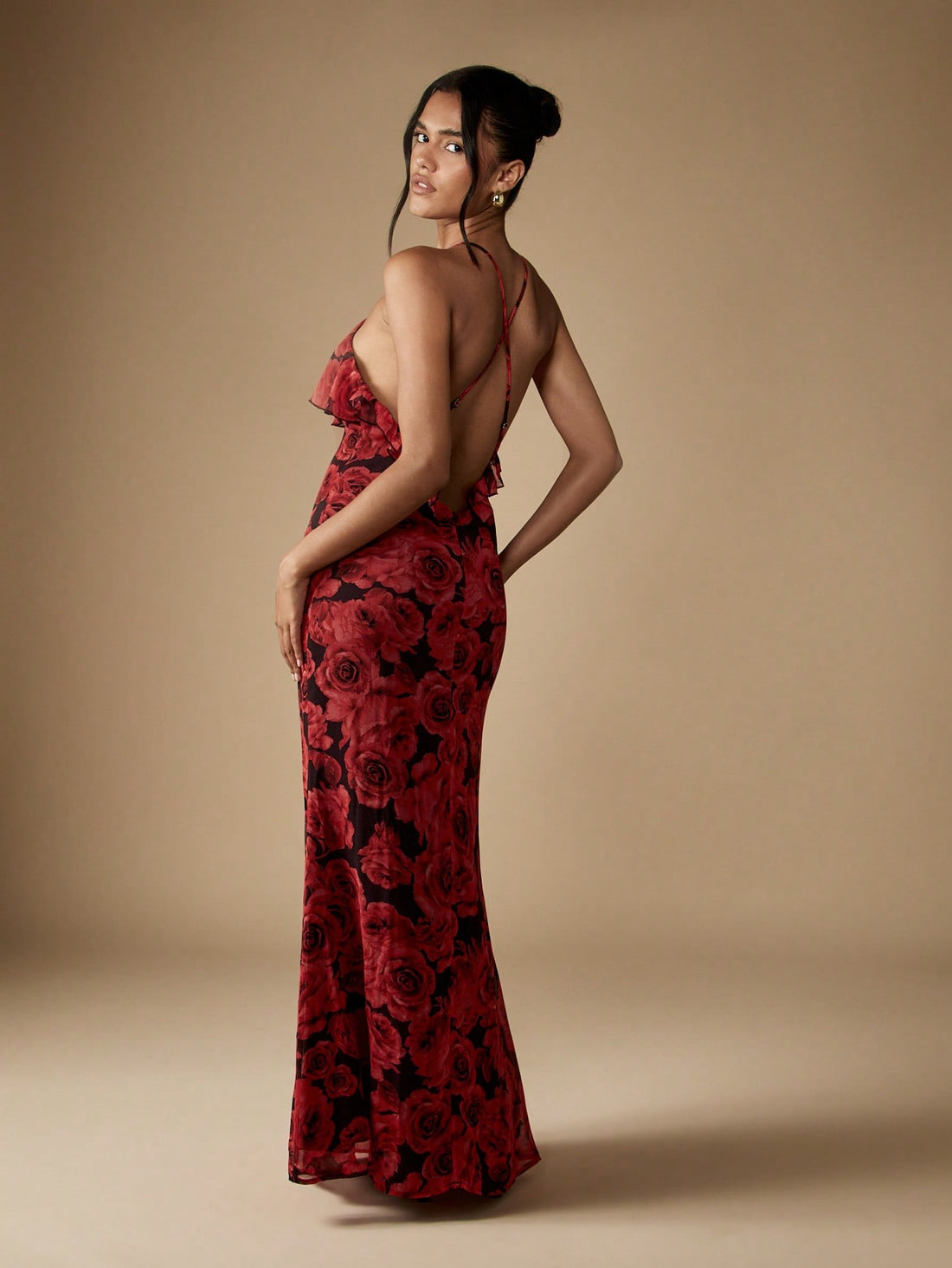 Step into celebration mode with this Elegant Floral Ruffle Maxi Dress, designed to turn heads at weddings and special occasions. Its playful ruffles and charming cut-out detail add a flirty twist to classic elegance. Lightweight and flowing, it moves beautifully with every step, making you the life of any party. Perfect for dancing, twirling, and making unforgettable memories in style.