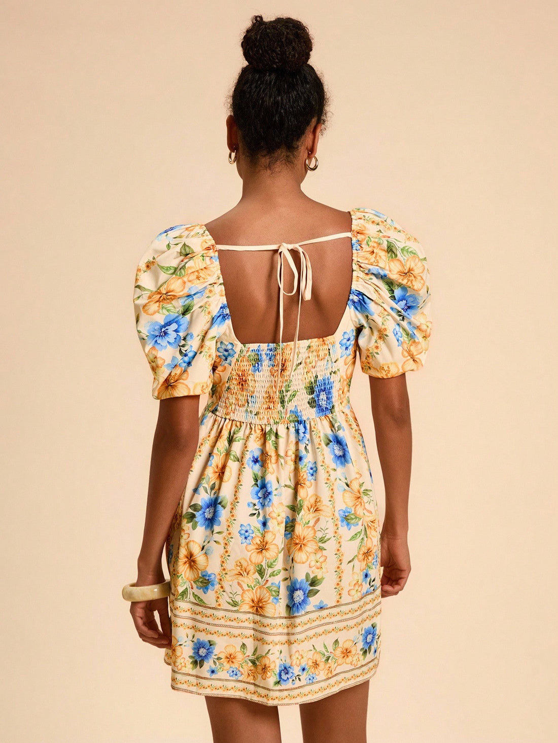 Turn heads this fall with the Chic Yellow Floral Bubble Mini Dress from Travachic. Featuring playful hibiscus prints and charming sleeves, this dress blends vibrant sunshine hues with cozy elegance. Its bubble silhouette adds a flirty bounce, perfect for fun-filled days and cool autumn evenings alike. Embrace the season with style that radiates warmth and cheer.