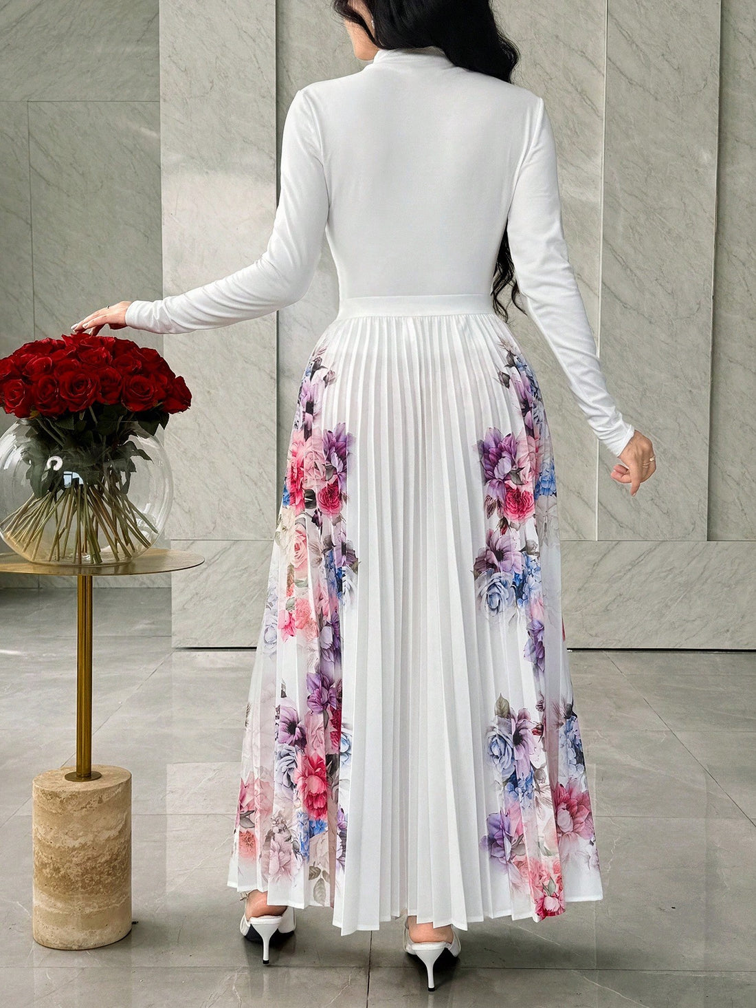 Bloom into effortless style with this charming two-piece set that's practically begging for a twirl! The long-sleeve top features a gorgeous floral print that brings garden-fresh vibes to your everyday wardrobe, while the pleated skirt adds a touch of feminine flair and movement. Perfect for brunch dates, casual outings, or whenever you want to feel put-together without trying too hard. Mix, match, or wear them together—this set is your new go-to for looking polished and playful all season long.