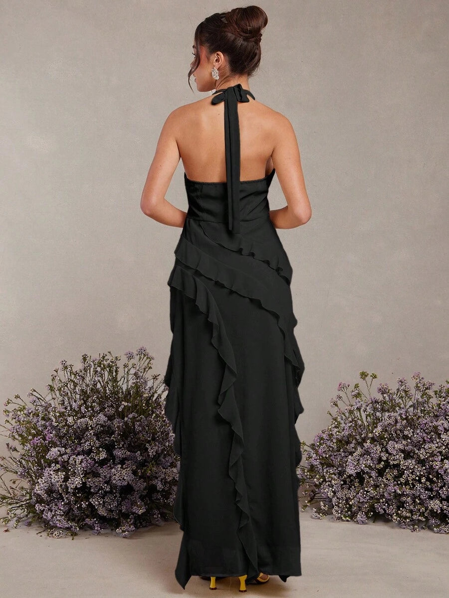 Step into summer romance with this Elegant Beige Halter Neck Maxi Dress. The ruffled neckline adds a flirty touch, while the flowing silhouette keeps you cool and comfortable all day long. Perfect for sunsets, garden parties, or carefree strolls, this dress combines effortless style with a playful vibe that’s sure to turn heads wherever you go.