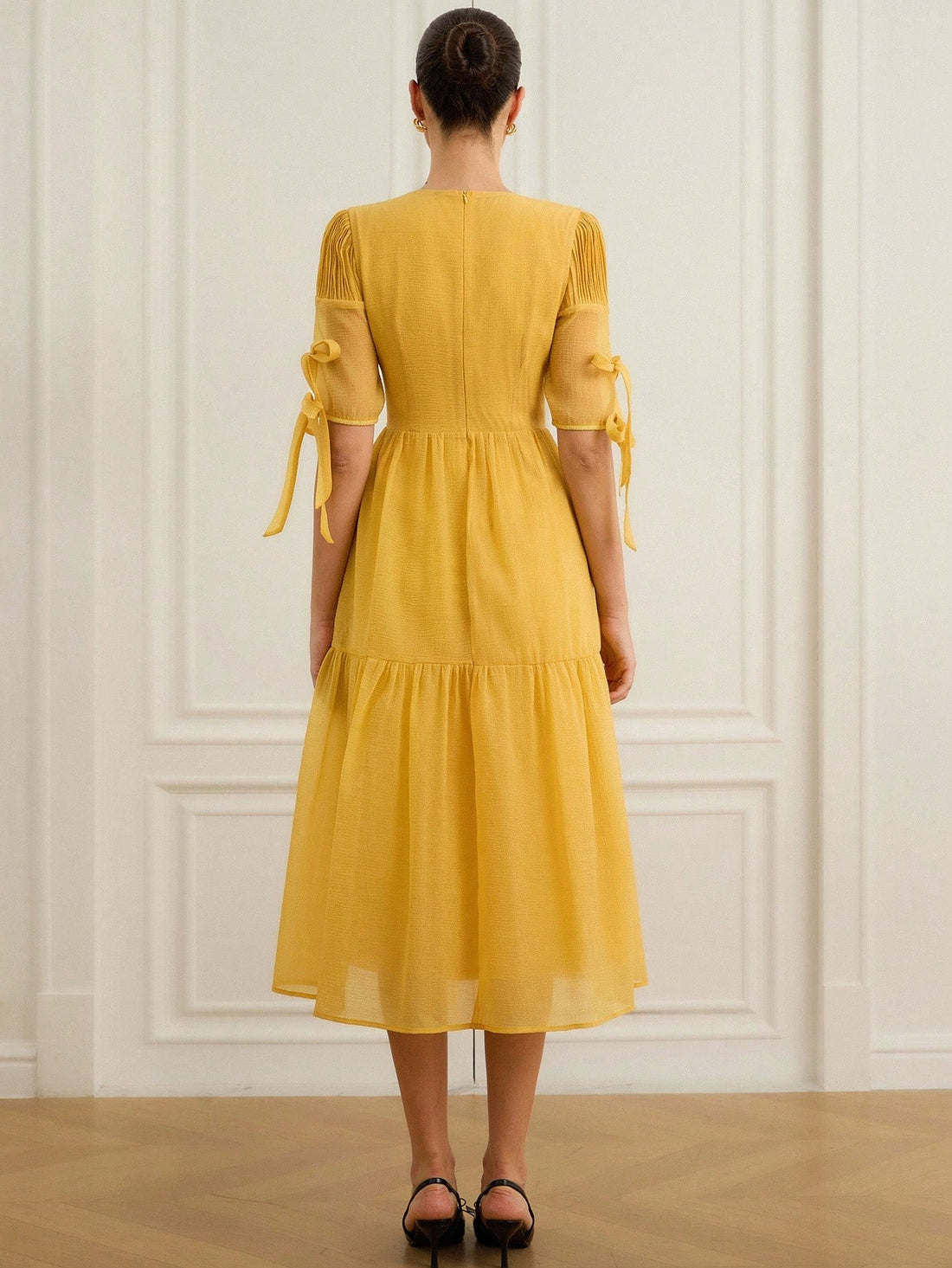 Dance through sunny days with this Stylish Pleated Chiffon Midi Dress, perfect for summer festivals and beach getaways. Its lightweight chiffon fabric flows effortlessly, while the playful pleats add a touch of twirl-worthy charm. Designed to keep you cool and comfortable, this dress is your go-to for breezy adventures and sun-soaked fun.