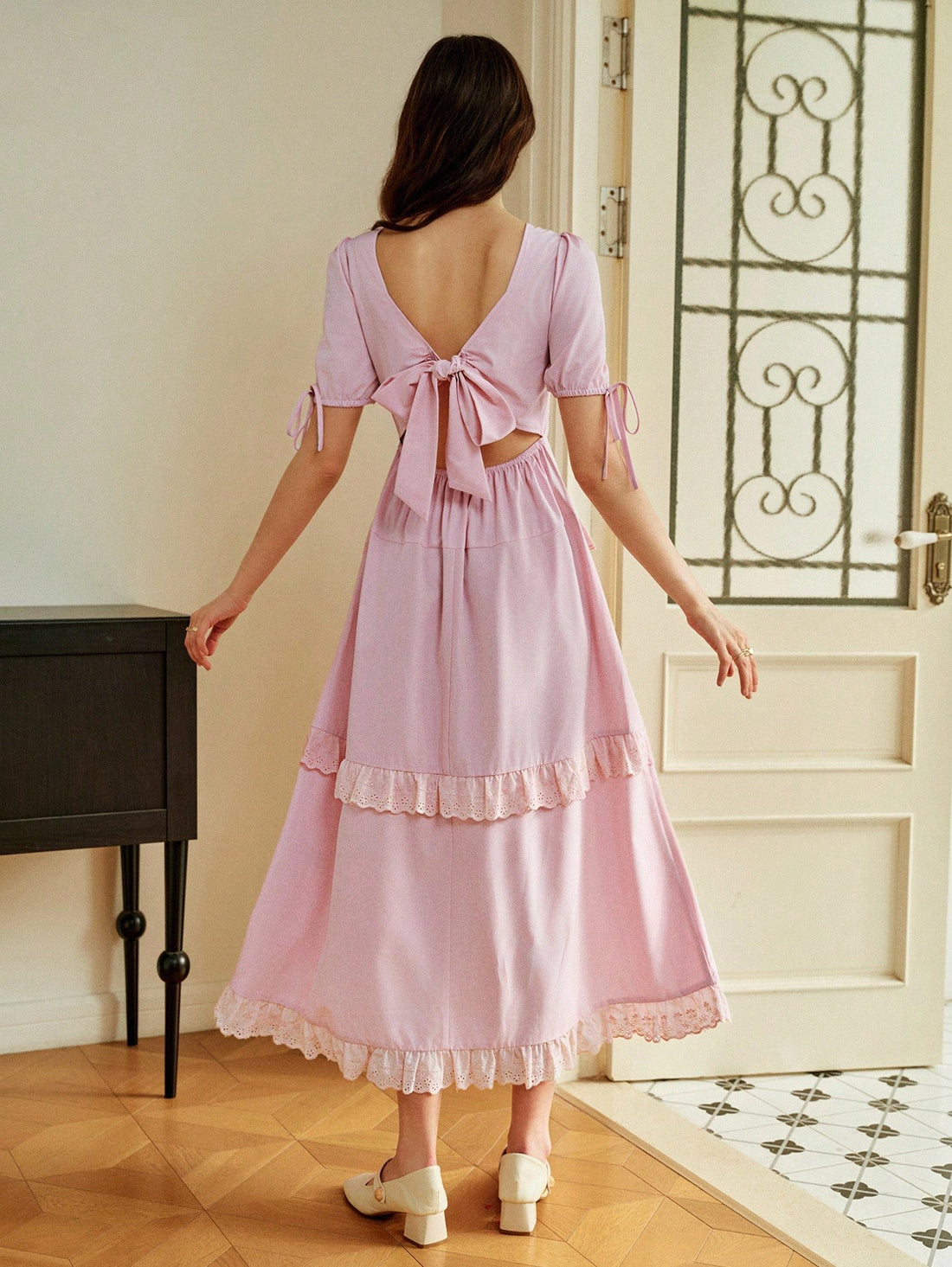 Make a statement in this stunning backless split dress that's equal parts daring and sophisticated. The delicate ruffled details add movement and charm, while the strategic cutouts create an alluring silhouette perfect for turning heads. Whether you're sipping tea with friends, attending a special event, or simply stepping out in style, this dress delivers effortless elegance with a playful twist. Versatile enough for various occasions yet bold enough to feel like your secret weapon for looking absolutely f