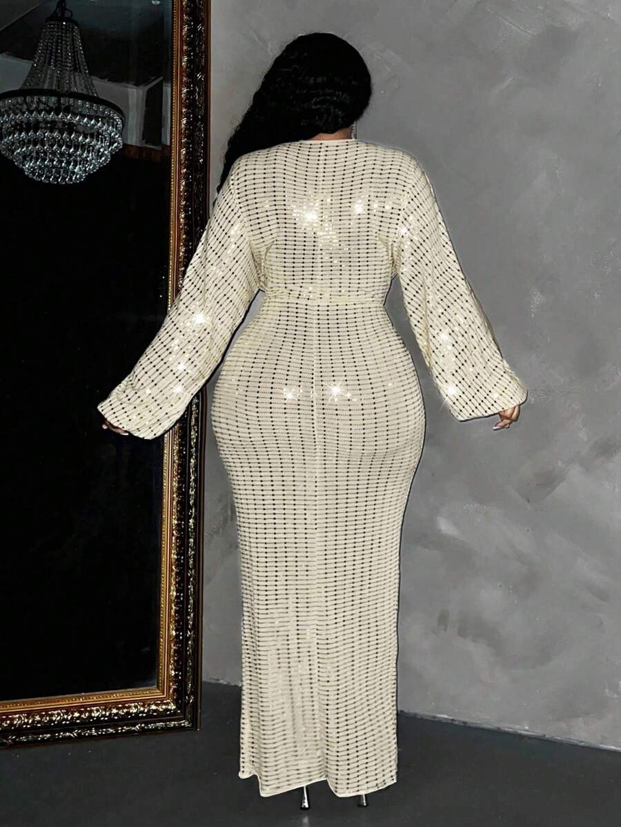 Shimmer and shine this season in our show-stopping sequin maxi dress! Designed for curves and confidence, this stunner features a flattering deep V neckline and elegant long sleeves that keep you cozy while turning heads. The full-length silhouette drapes beautifully, making it your go-to choice for holiday parties, festive celebrations, and special occasions. Sequins catch the light with every move, ensuring you'll be the most dazzling guest in the room. Celebrate in style and comfort with this plus-size e