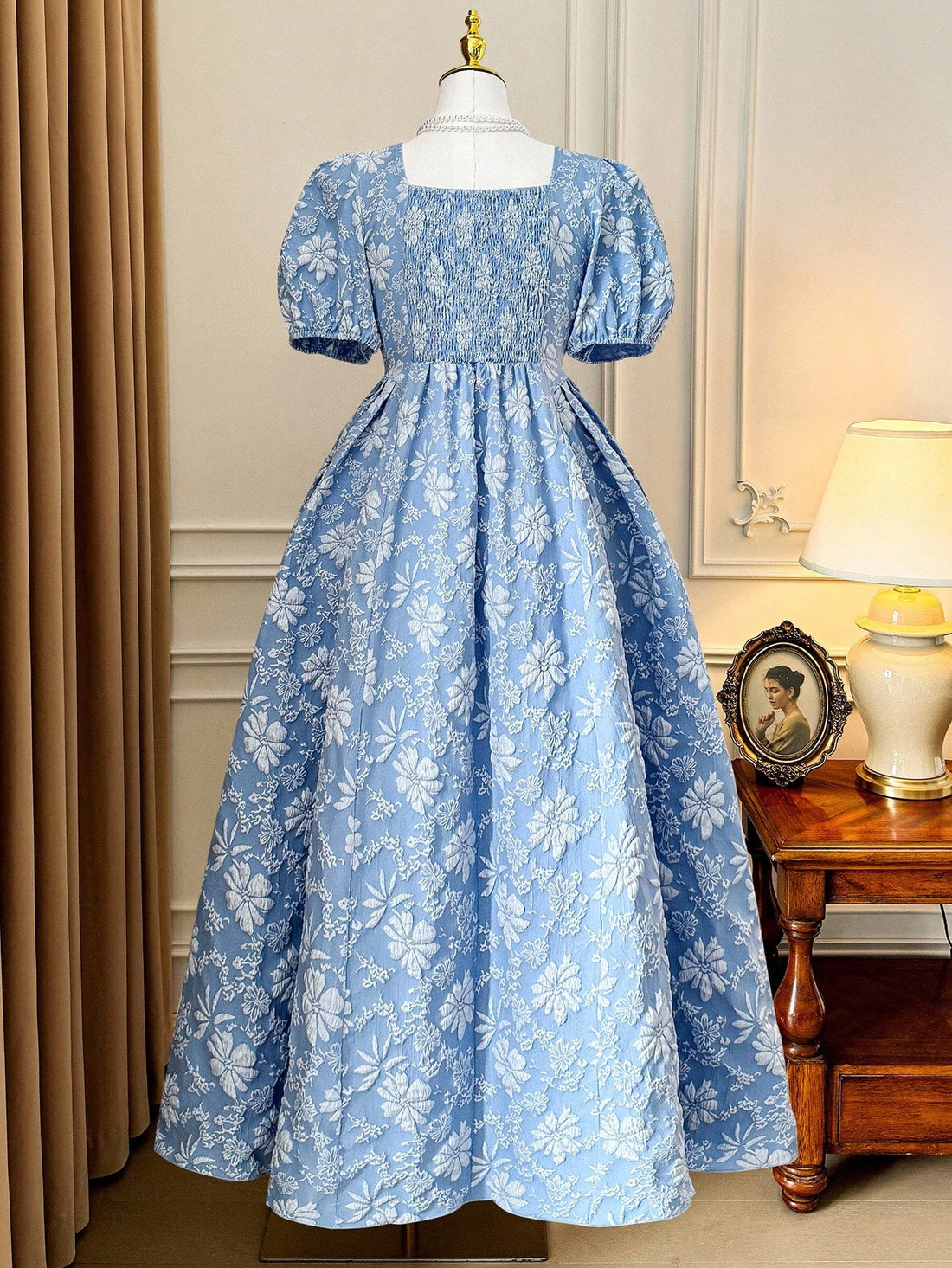 Step into romance with this elegant plus size dress featuring a charming square neckline and playful puff sleeves. Its flared silhouette and textured fabric add a whimsical touch, perfect for twirling through any occasion with confidence and style.