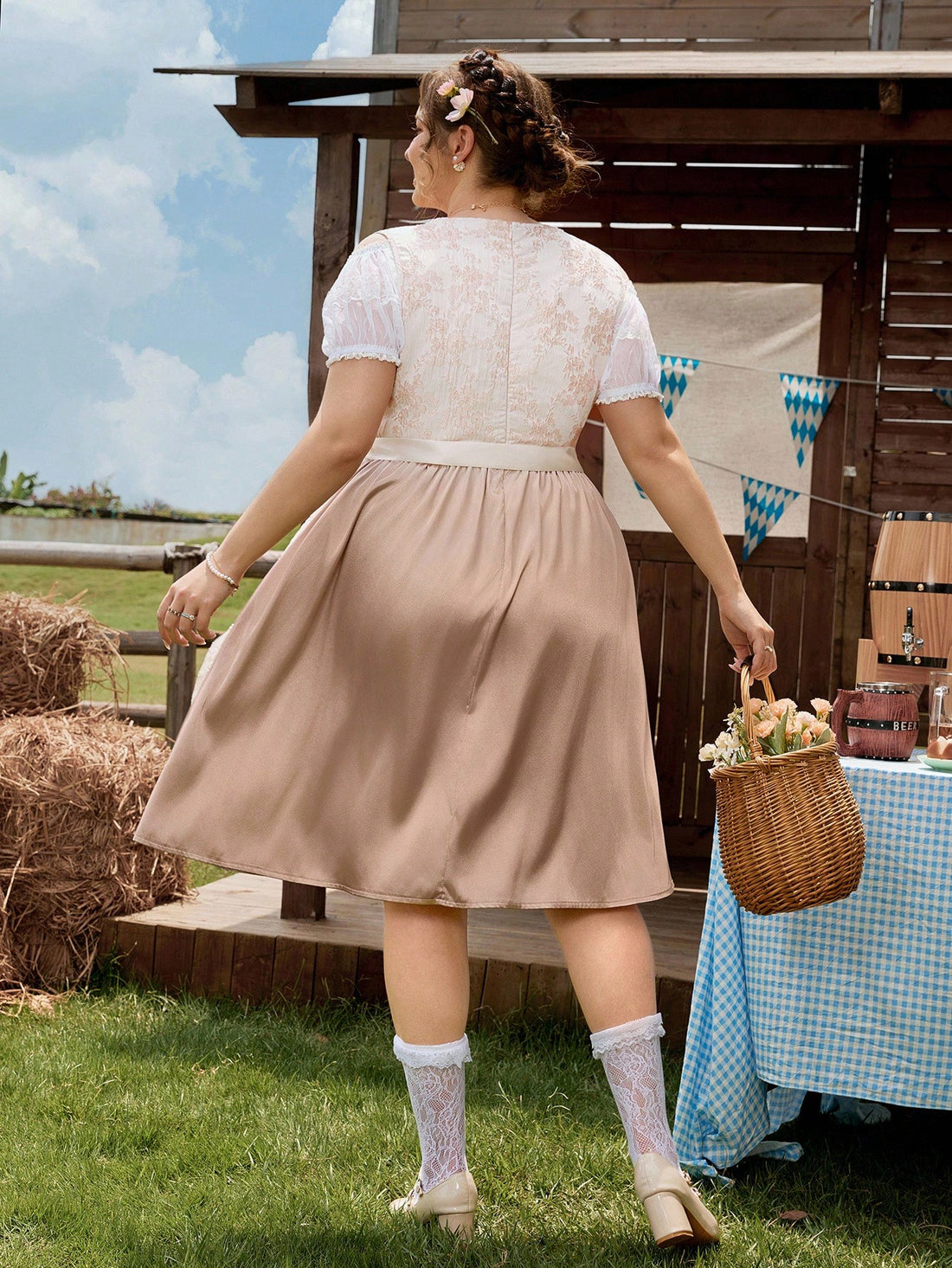 Celebrate Oktoberfest in style with this Elegant Plus Size Dirndl Dress, featuring charming lace patchwork and rich jacquard fabric. Designed to flatter your curves while keeping the festive spirit alive, this dress brings a playful twist to traditional Bavarian fashion. Perfect for dancing, toasting, and making unforgettable memories—all with a touch of elegant flair.