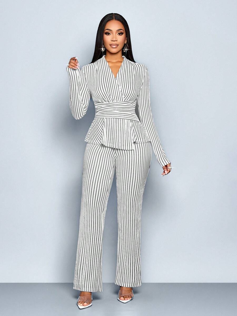 Elevate your winter wardrobe with this chic two-piece set that effortlessly blends comfort and style. The striped V-neck long sleeve tee pairs perfectly with wide-leg pants featuring a trendy asymmetrical hem, creating an instantly polished look. Whether you're heading to brunch or running errands, this versatile ensemble delivers that "I woke up like this" vibe while keeping you cozy all season long. Mix, match, or wear together—either way, you're winning the casual fashion game.