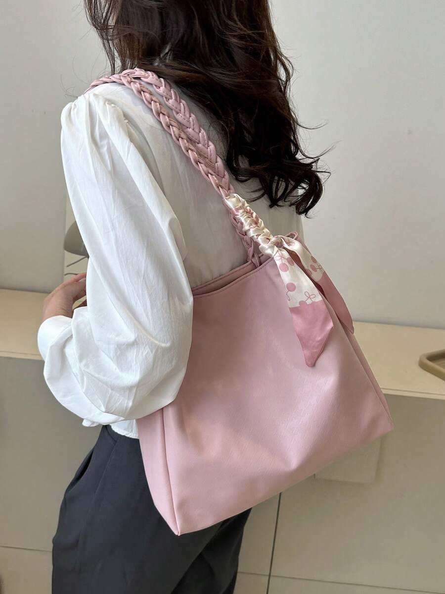 Elevate your everyday carry with this chic minimalist tote. Crafted from durable polyester, this small shoulder bag features a clean solid pink design accented with a versatile scarf detail for effortless style. The double handles and secure zipper closure make it perfect for commuting, shopping, or casual outings. Braid detailing adds subtle sophistication to this practical, fashion-forward accessory.