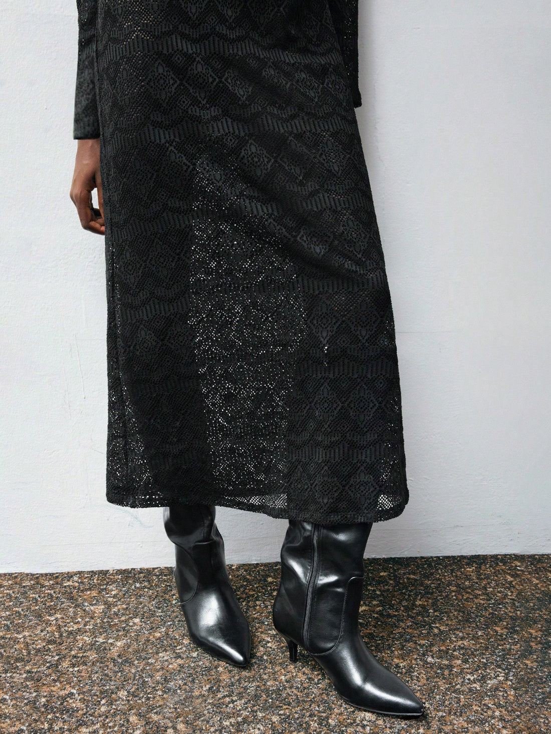 Turn heads effortlessly with this Elegant Minimalist Hollow Out Long Sleeve Knitted Dress. Its sleek design and subtle cutouts add a playful twist to a classic silhouette, making it your go-to for parties or any fun night out. Stay comfortable and stylish with a snug fit that shows off just enough skin, blending sophistication and flirtiness in one irresistible dress.