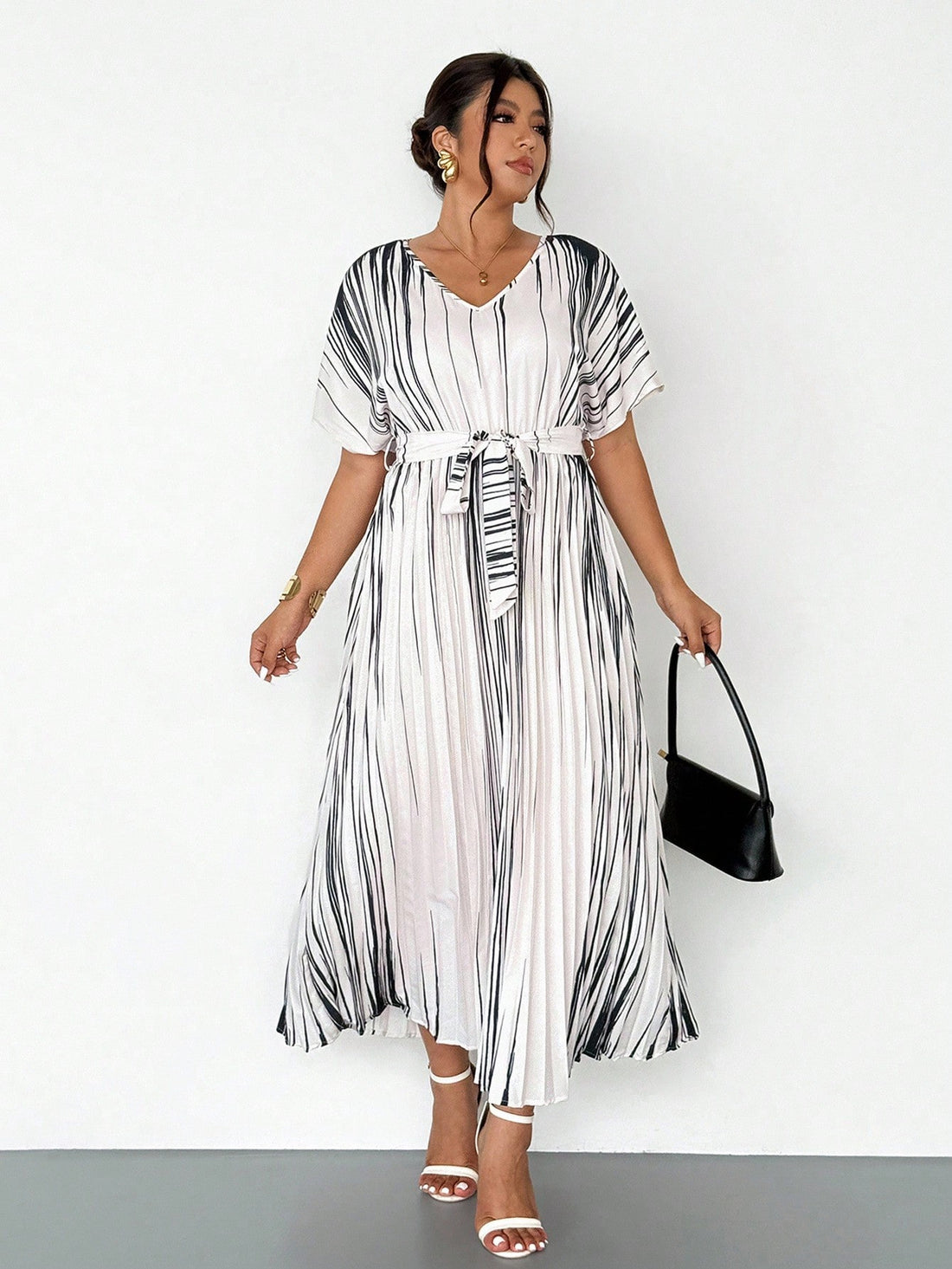 Step into spring and summer with this elegant plus size ruffle casual dress, designed to bring charm and comfort to your wardrobe. Its playful ruffles add a flirty twist, making it ideal for both workdays and vacation getaways. Lightweight and breezy, this dress moves with you, keeping you cool and confident no matter where the day takes you. Embrace effortless style that flatters your curves and lifts your mood!