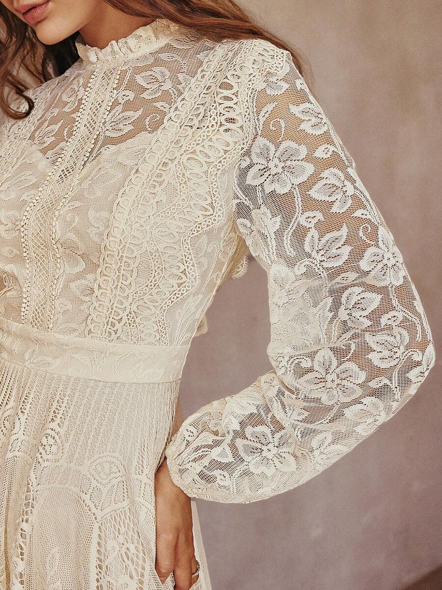 Twirl into the spotlight in this stunning long sleeve lace dress that's basically made for making an entrance. The delicate lace detailing catches every light while the flared hem adds that perfect swish-and-sway factor. Whether you're heading to an evening soirée, celebrating with friends, or marking a special moment, this dress delivers elegance with a fun-loving spirit. The long sleeves keep things sophisticated while the flowing silhouette ensures you'll feel as fabulous as you look. Your go-to dress fo