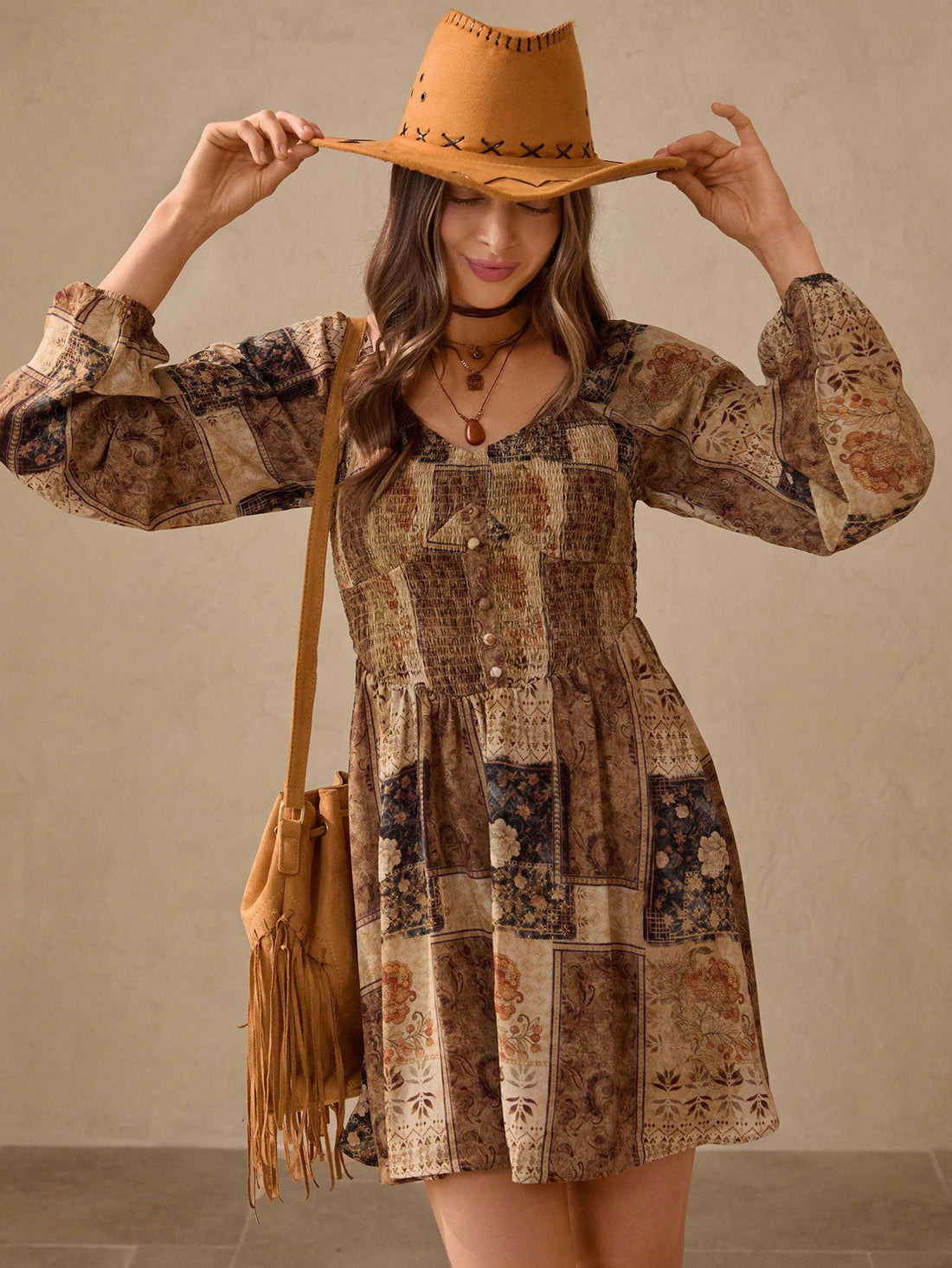 Embrace the carefree spirit of fall with this Boho Floral Print Backless Mini Dress. Featuring earthy tones and long sleeves, this babydoll dress merges comfort with a flirty vibe. Perfect for concerts or vacations, its playful backless design adds a touch of charm that keeps you dancing and turning heads wherever you go.